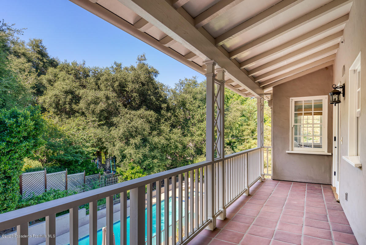 153 Sierra View Road Pasadena, CA 91105 - Photo 33 of 54 a view of a porch and garden