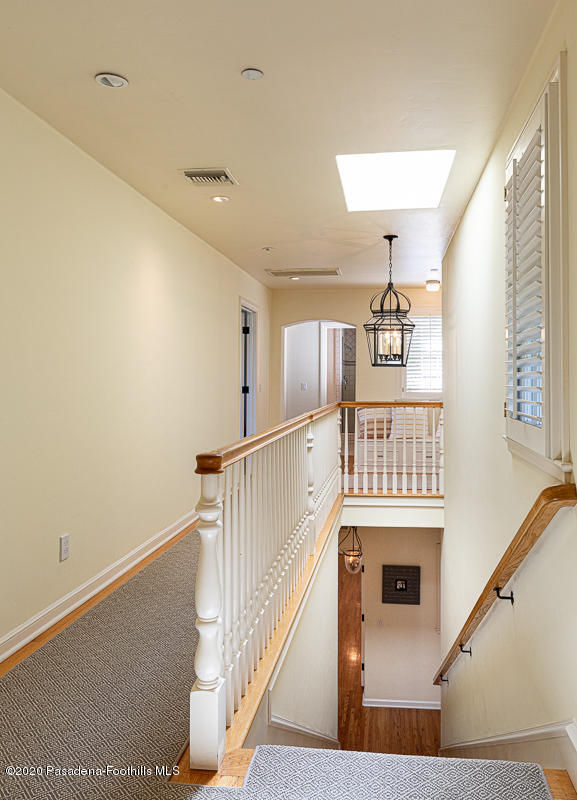 153 Sierra View Road Pasadena, CA 91105 - Photo 36 of 54 a view of entryway and hall with wooden floor
