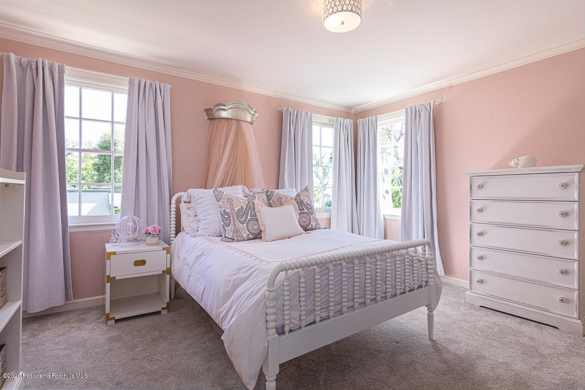 153 Sierra View Road Pasadena, CA 91105 - Photo 37 of 54 a bedroom with a bed and a window