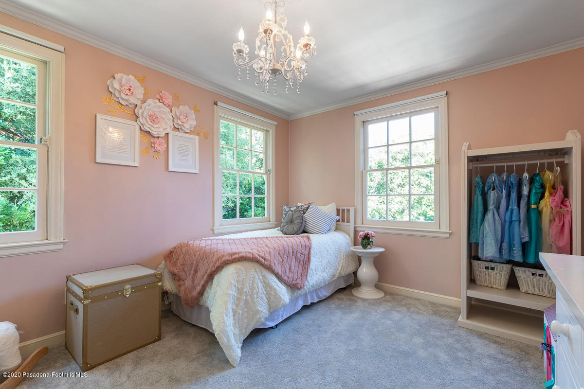 153 Sierra View Road Pasadena, CA 91105 - Photo 39 of 54 a bedroom with a bed and a window
