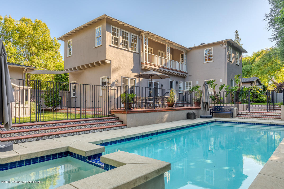 153 Sierra View Road Pasadena, CA 91105 - Photo 5 of 54 a view of a patio with swimming pool table and chairs