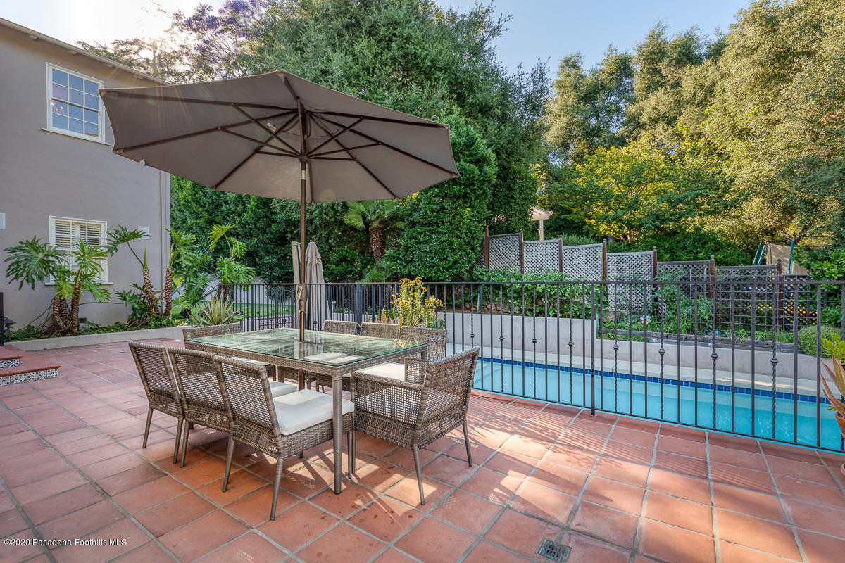 153 Sierra View Road Pasadena, CA 91105 - Photo 51 of 54 a view of backyard with seating space and wooden fence