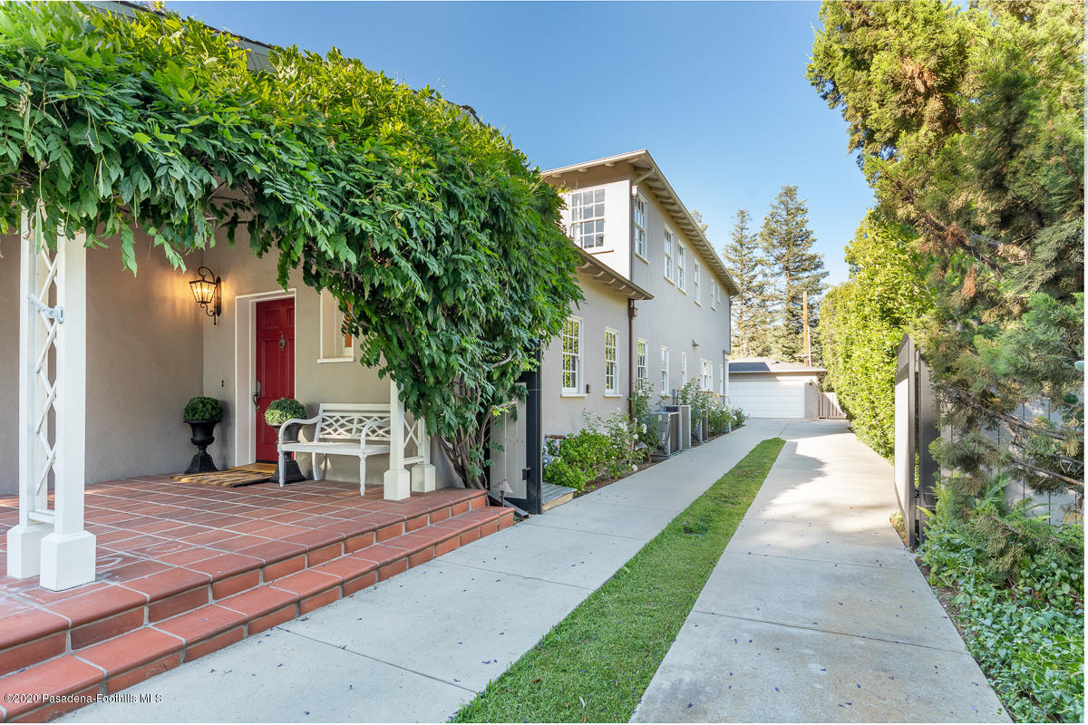 153 Sierra View Road Pasadena, CA 91105 - Photo 53 of 54 a front view of a house with a yard and trees