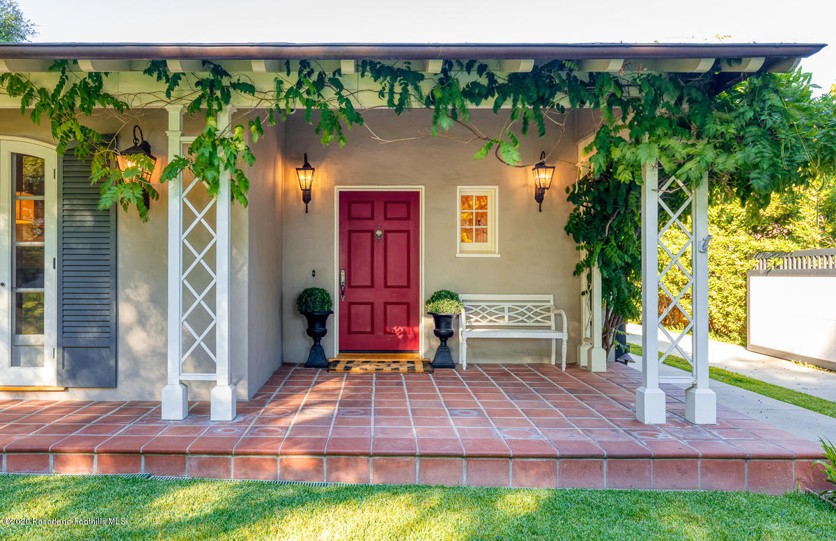153 Sierra View Road Pasadena, CA 91105 - Photo 7 of 54 a front view of a house with garden