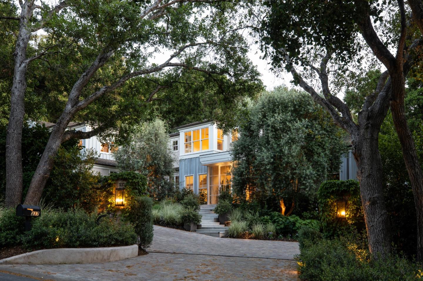 337 Walsh Road Atherton, CA 94027 - Photo 1 of 1 a front view of a house with trees and plants