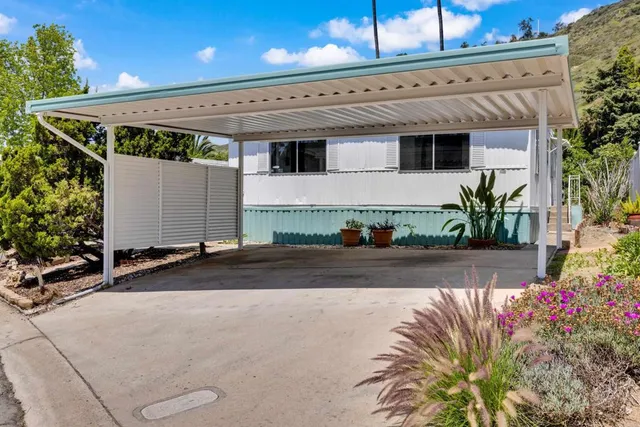 a front view of a house with a garage