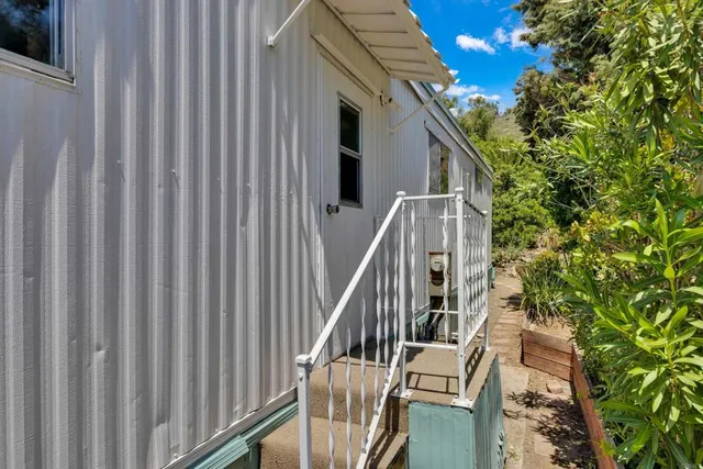 a childrens park with lots of swings and slides