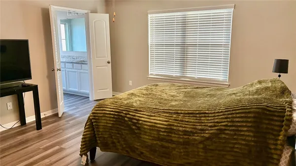 a view of a bedroom with window