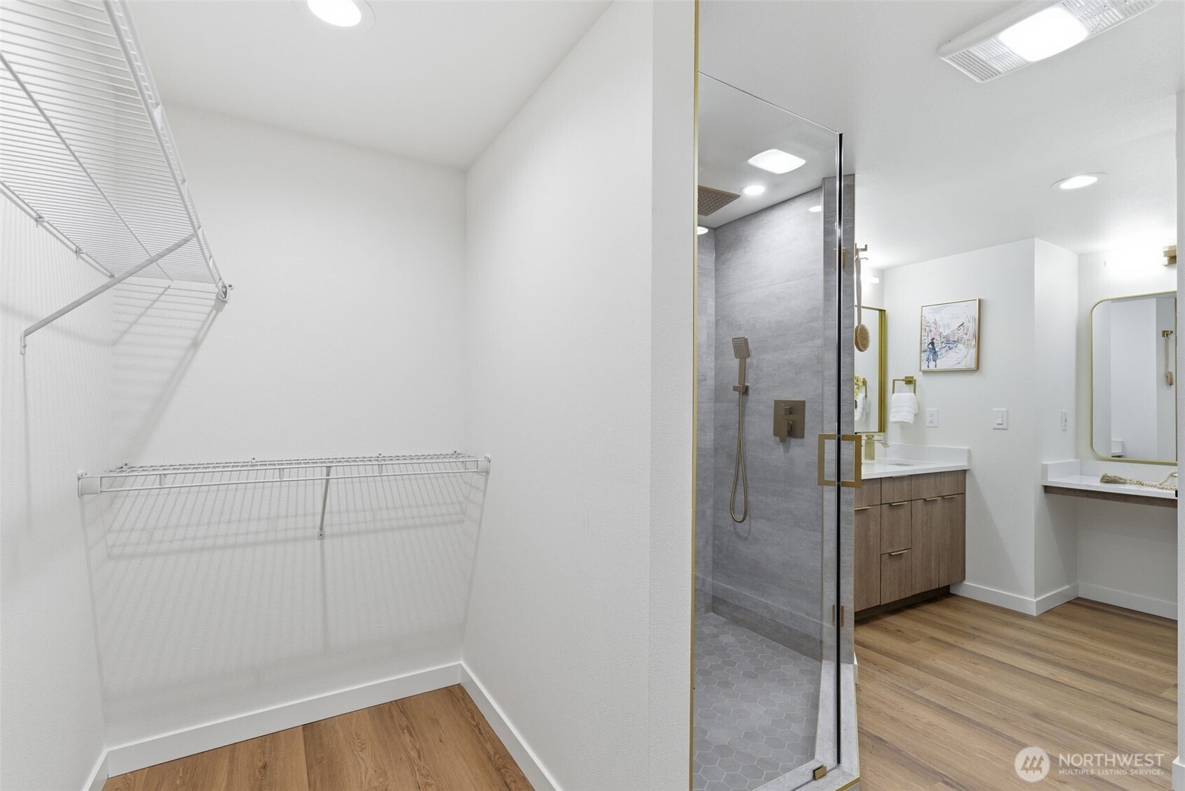 8505 Bridgeport Way Southwest Lakewood, WA 98499 - Photo 13 of 39 a bathroom with a shower and a sink