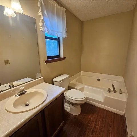 a bathroom with a sink and shower