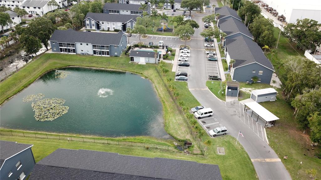 4136 Pershing Pointe Place, Unit 5 Orlando, FL 32822 - Photo 21 of 21 an aerial view of a house with swimming pool