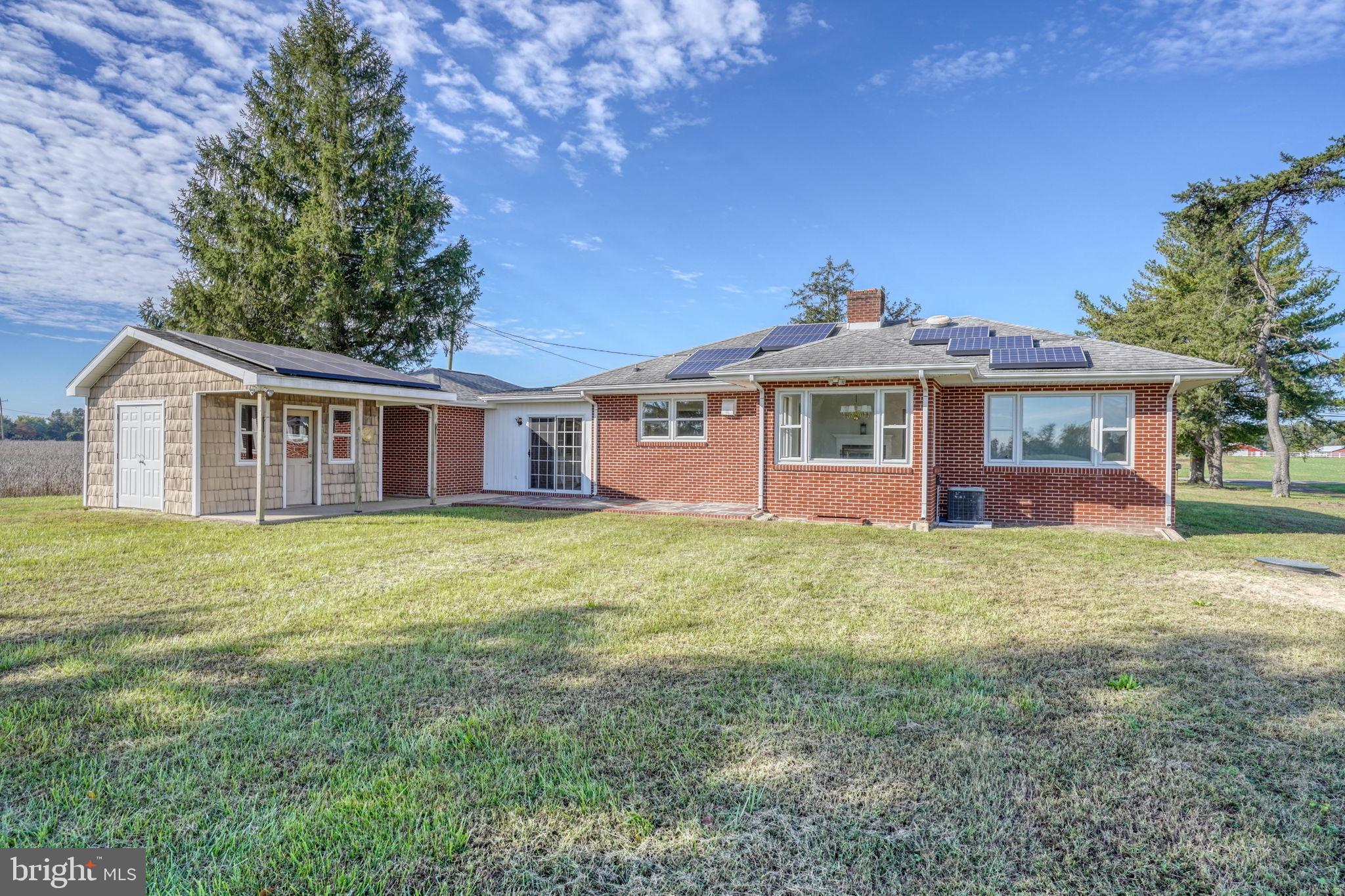 2968 Deep Grass Lane Houston, DE 19954 - Photo 11 of 41 a front view of a house with a garden