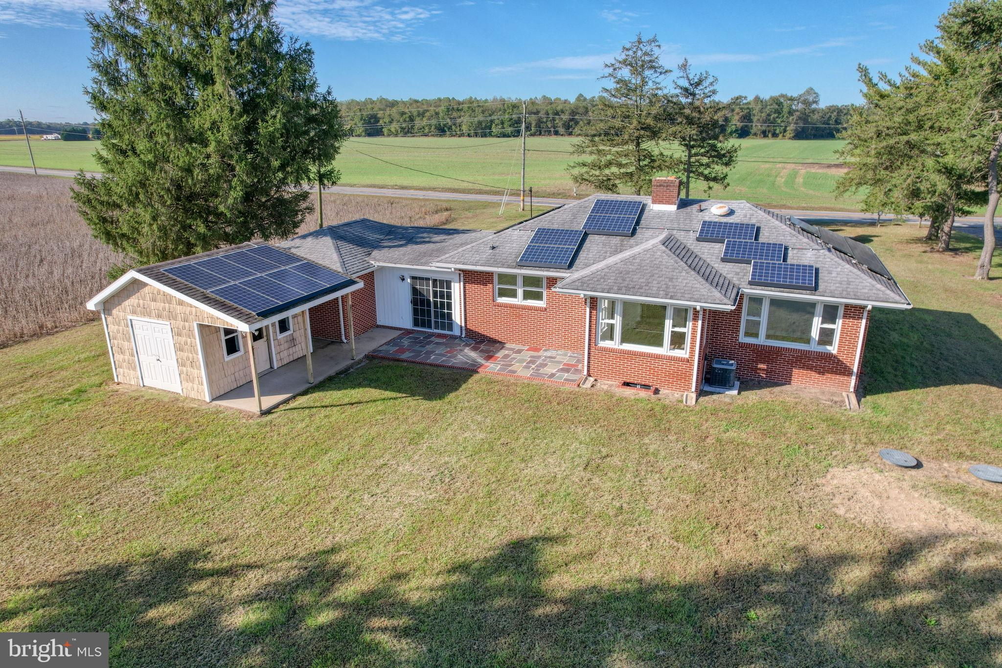 2968 Deep Grass Lane Houston, DE 19954 - Photo 12 of 41 a aerial view of a house with a big yard and large trees