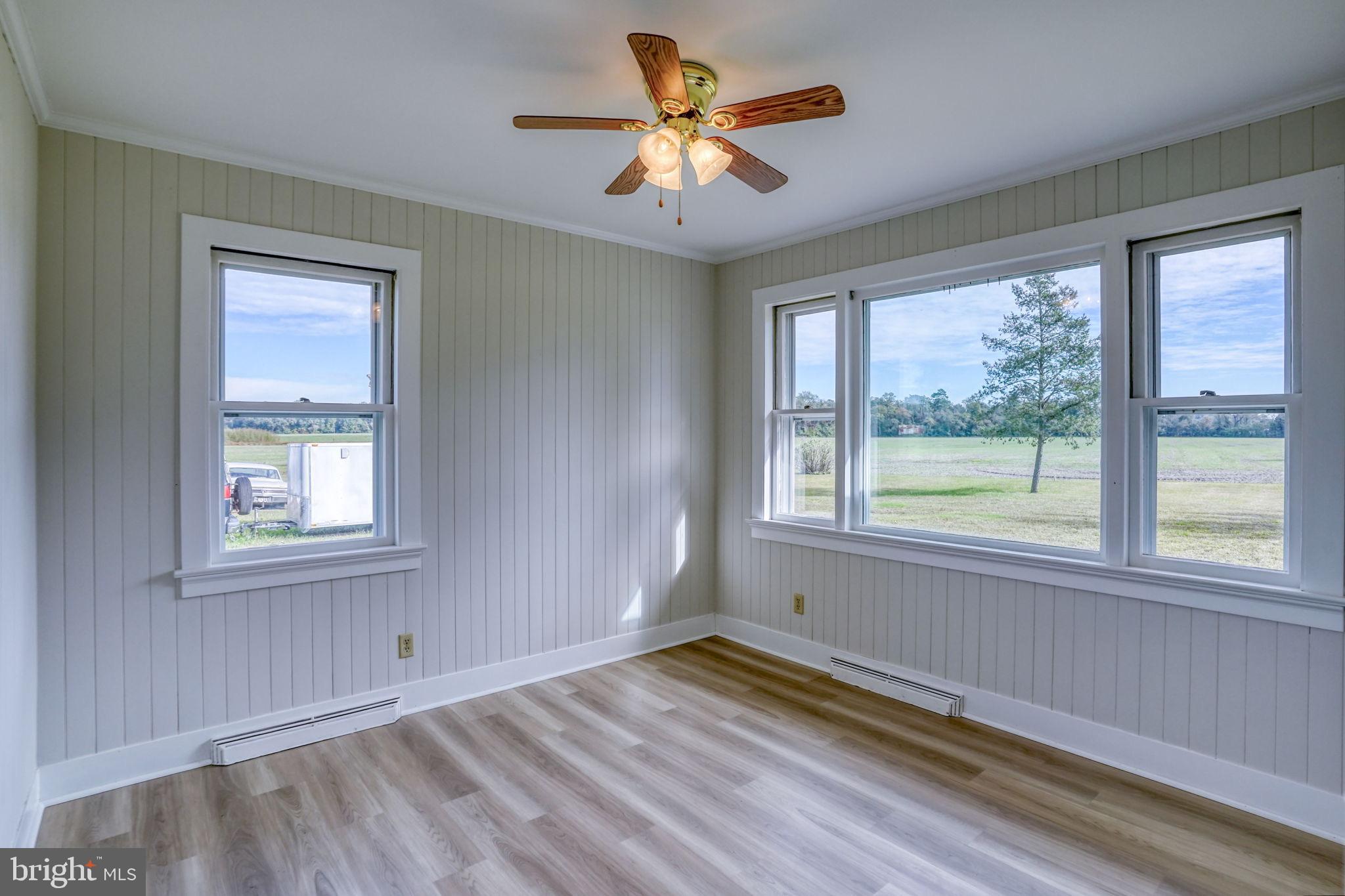2968 Deep Grass Lane Houston, DE 19954 - Photo 35 of 41 a view of empty room with a window and a ceiling fan