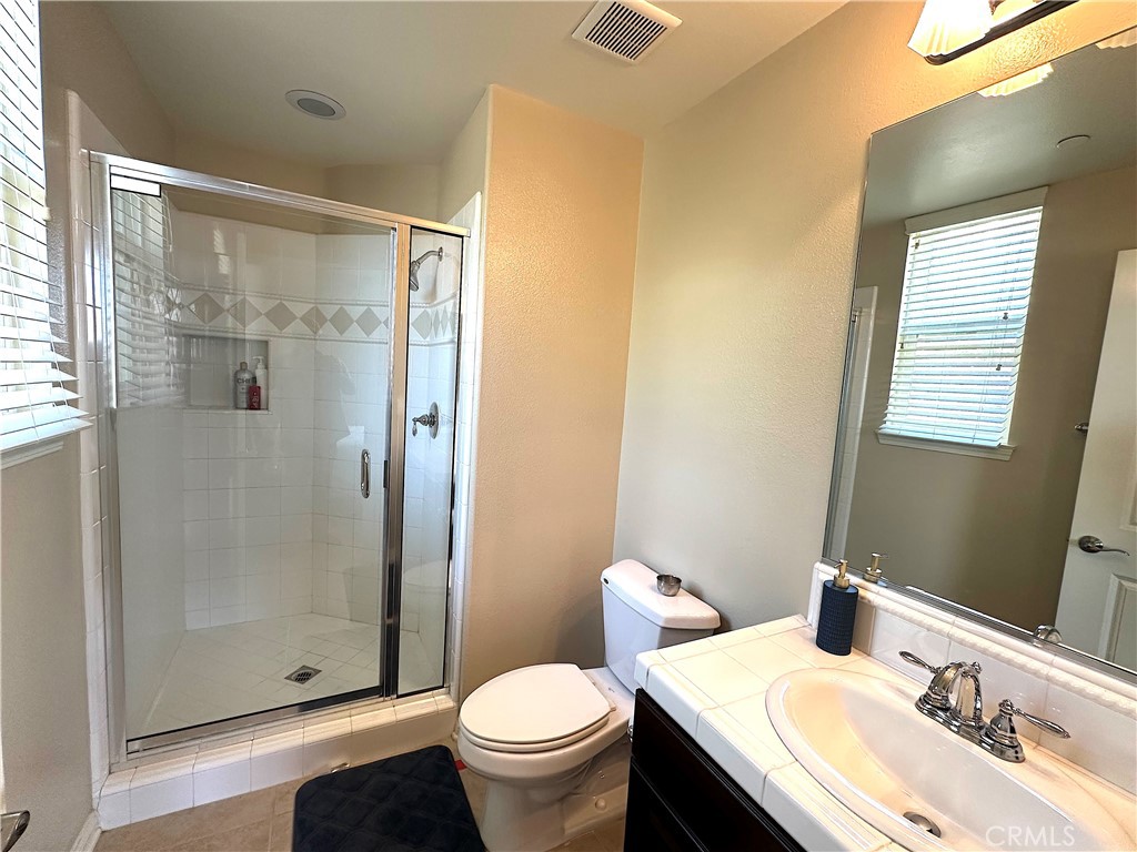 20420 West Vía Urbino Porter Ranch, CA 91326 - Photo 11 of 22 Main Level Full Bathroom
