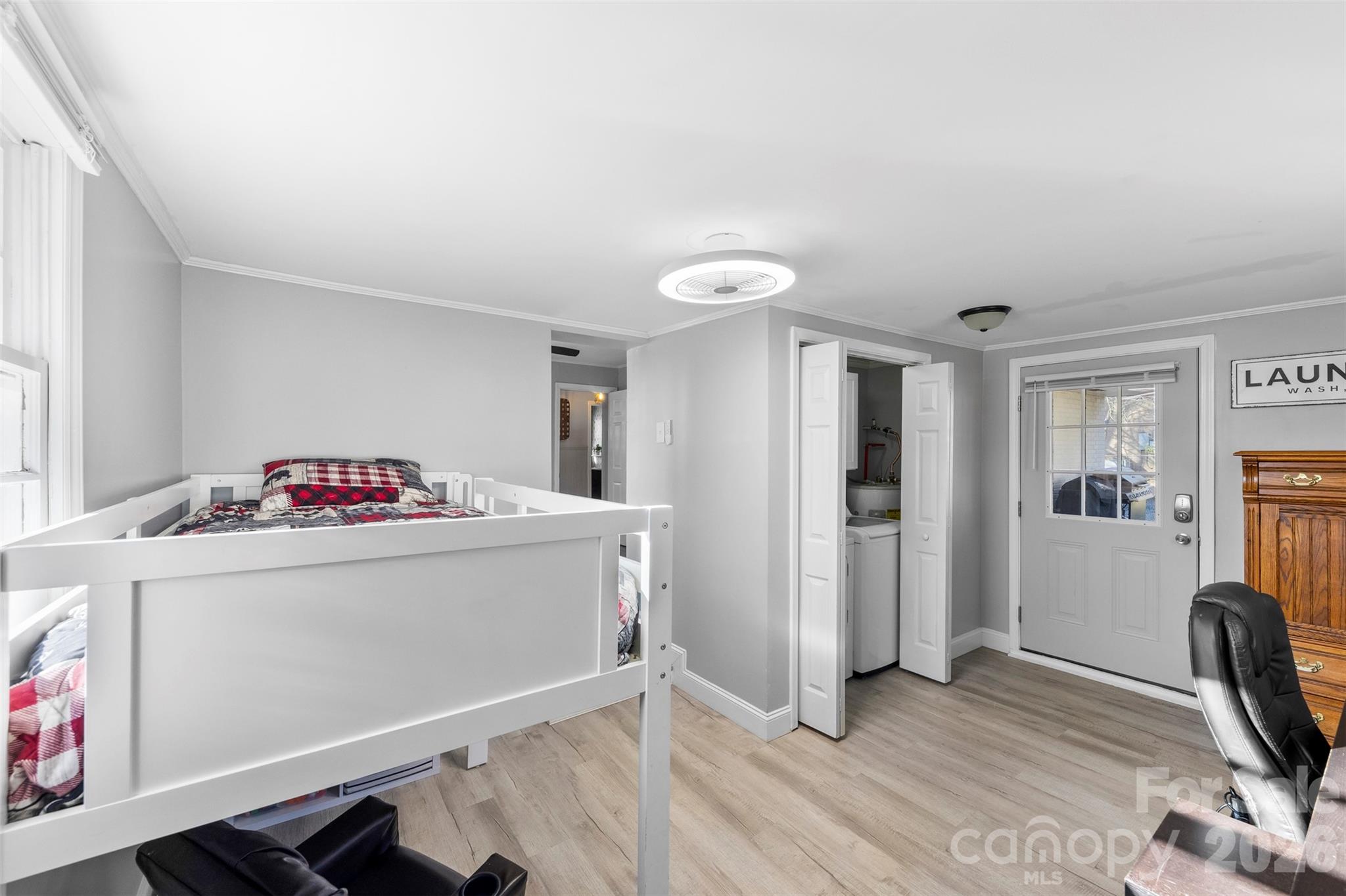 652 Dallas Spencer Mountain Road Dallas, NC 28034 - Photo 19 of 26 a view of a kitchen with fridge and wooden floor