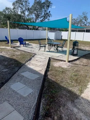 a view of outdoor space with seating area