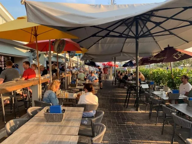 a view of a chairs and tables in patio