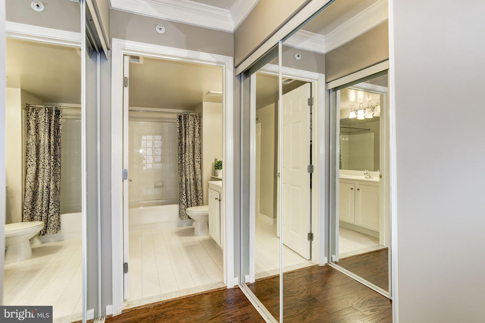 11710 Old Georgetown Road, Unit 1127 North Bethesda, MD 20852 - Photo 15 of 30 a view of a bathroom from a glass door