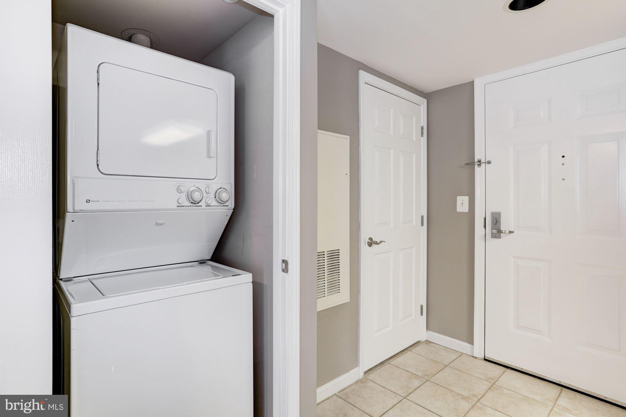 11710 Old Georgetown Road, Unit 1127 North Bethesda, MD 20852 - Photo 20 of 30 a utility room with dryer and washer
