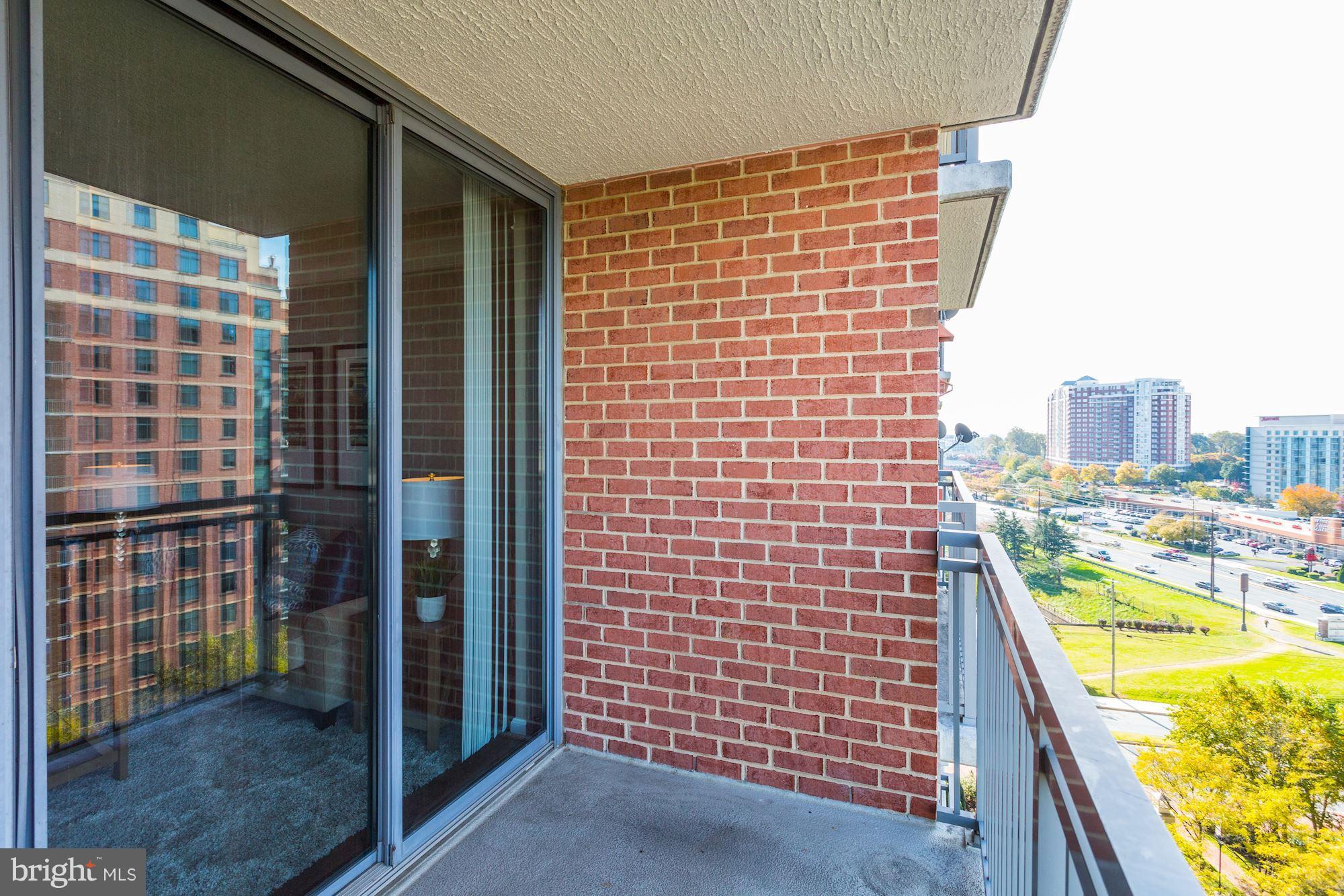 11710 Old Georgetown Road, Unit 1127 North Bethesda, MD 20852 - Photo 22 of 30 a view of balcony with a kitchen