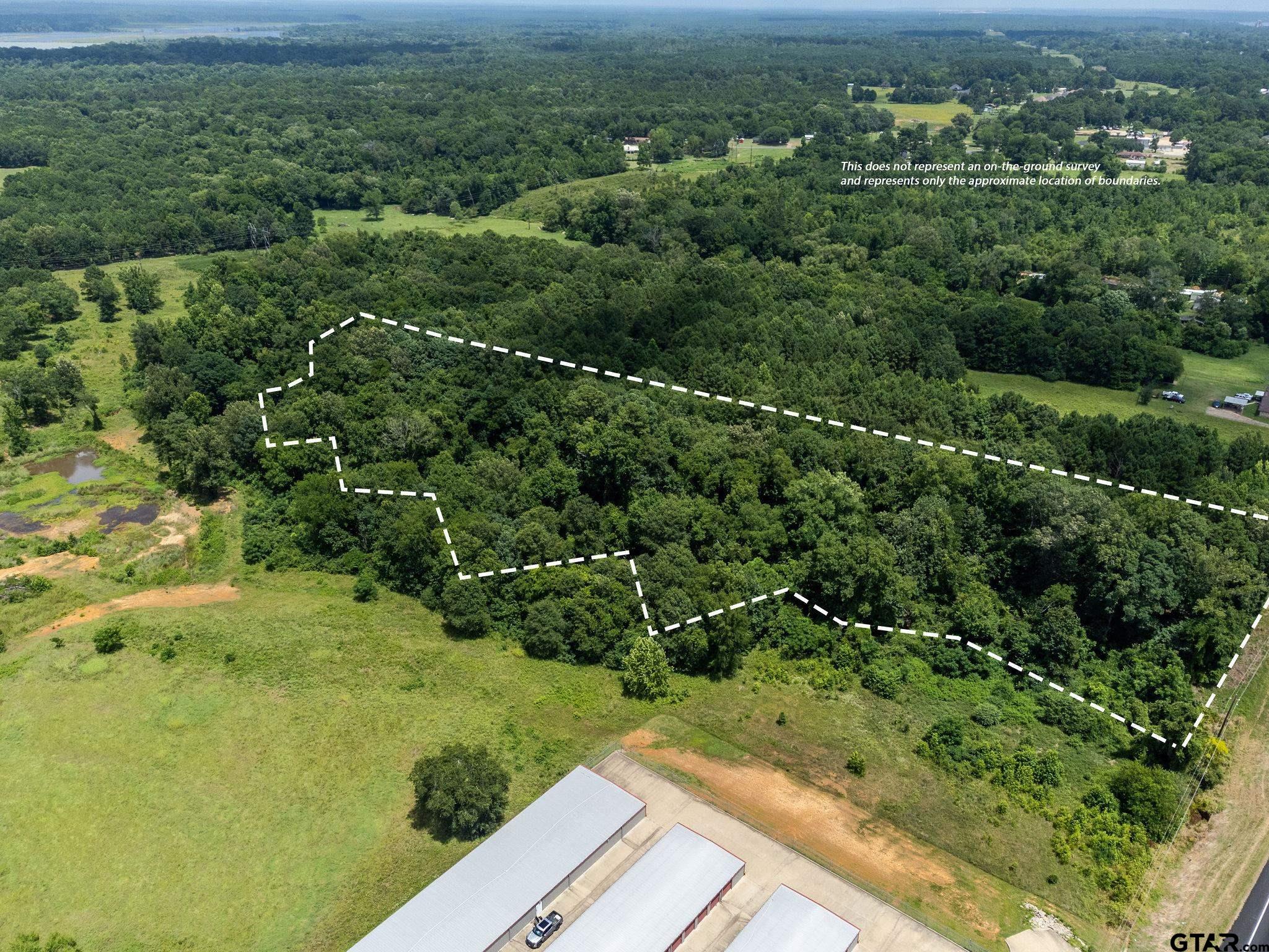 149 St Longview Tx 75603 Longview, TX 75601 - Photo 6 of 12 an aerial view of residential houses with outdoor space and trees