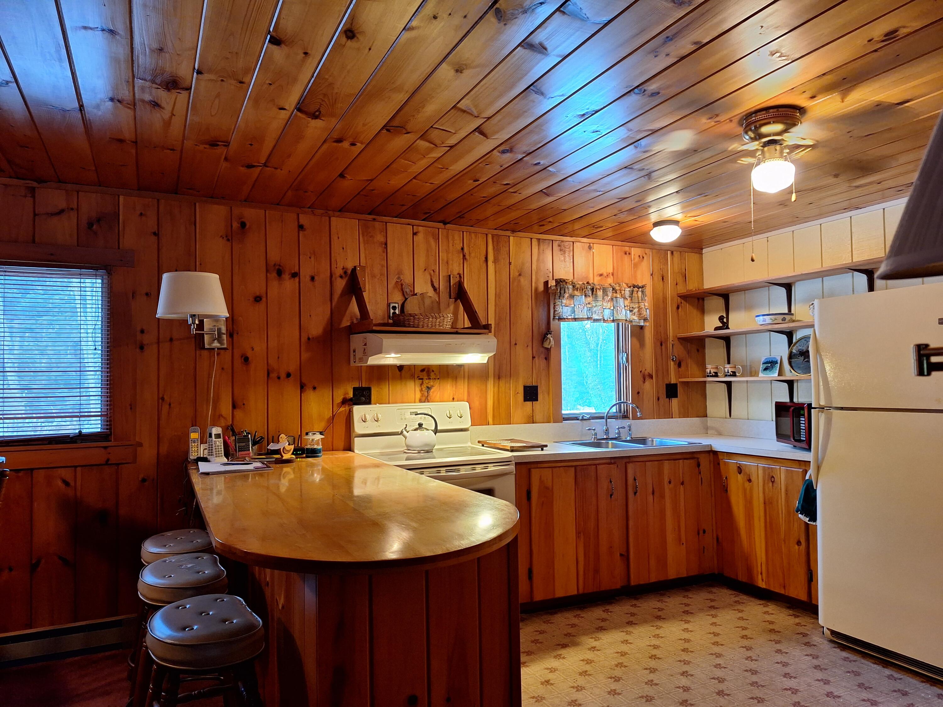 17 Summer Road Rangeley, ME 04970 - Photo 21 of 45 kitchen has large pantry closet.