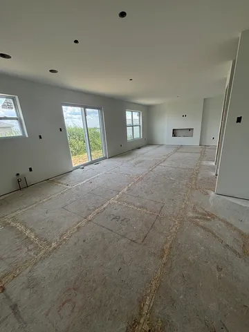 an empty room with a bench