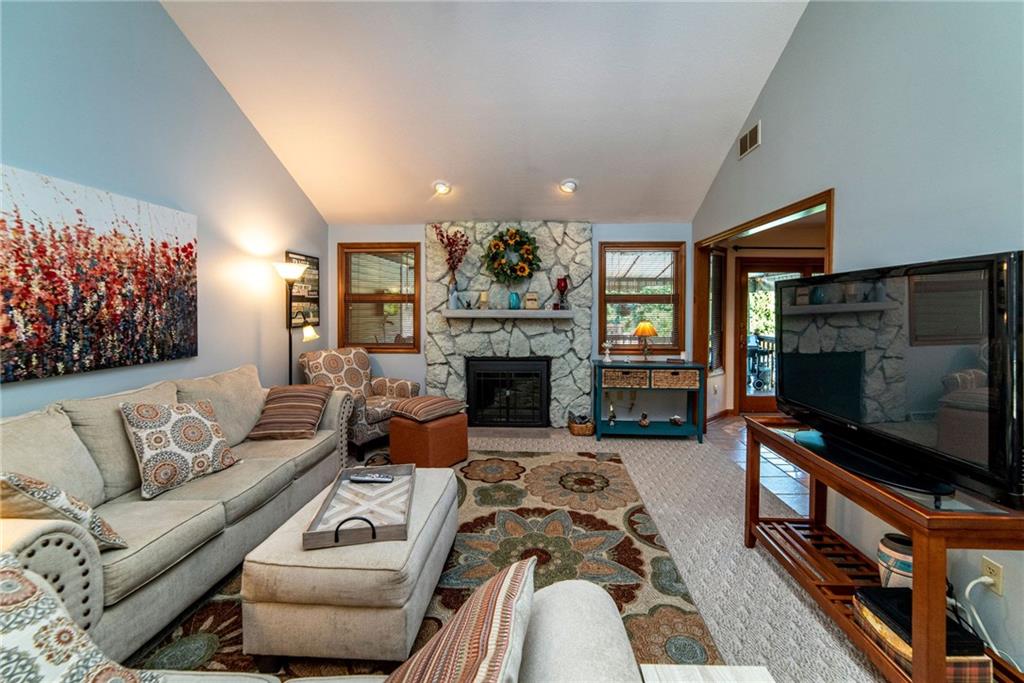 170 McDermott Road Trafford, PA 15085 - Photo 2 of 25 Family room with gas log stone fireplace.