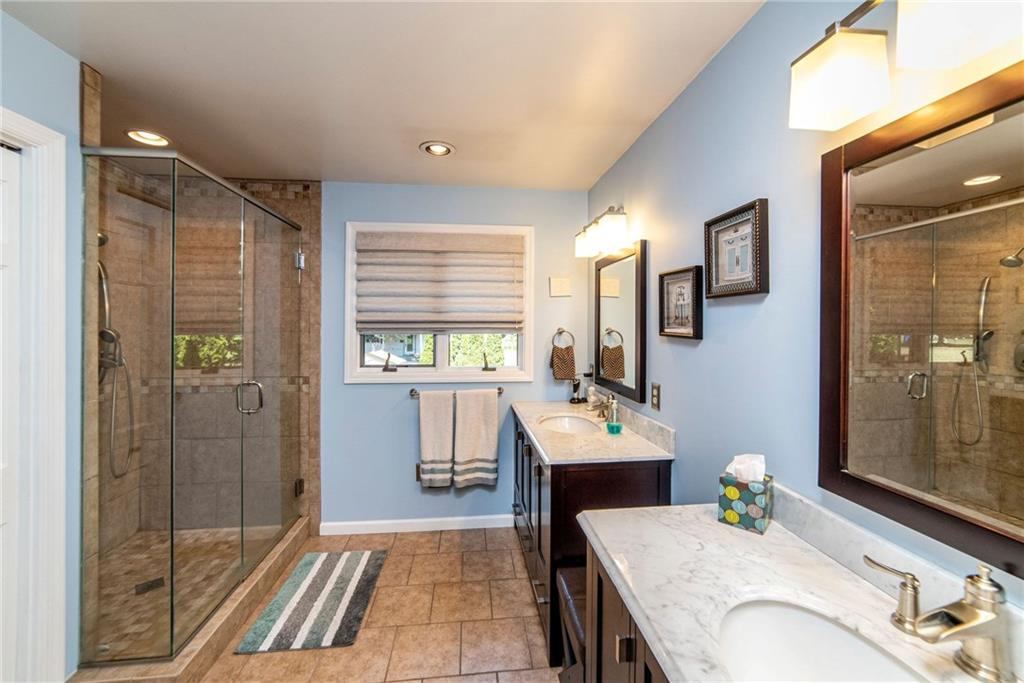 170 McDermott Road Trafford, PA 15085 - Photo 11 of 25 Spa bath with walk in shower, double vanities