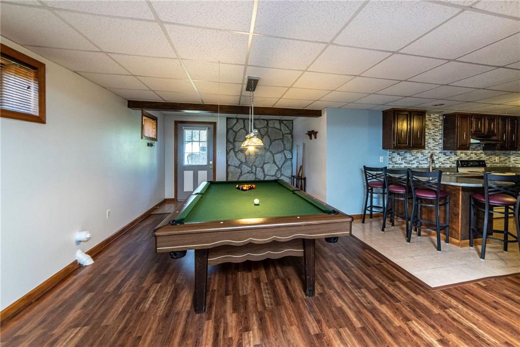 170 McDermott Road Trafford, PA 15085 - Photo 16 of 25 Awesome finished lower level! Full kitchen. 2 additional large rooms in the lower level . Could be used for an office, bedroom, play room or flex space. Also a wine cellar! Great place to entertain family and friends!