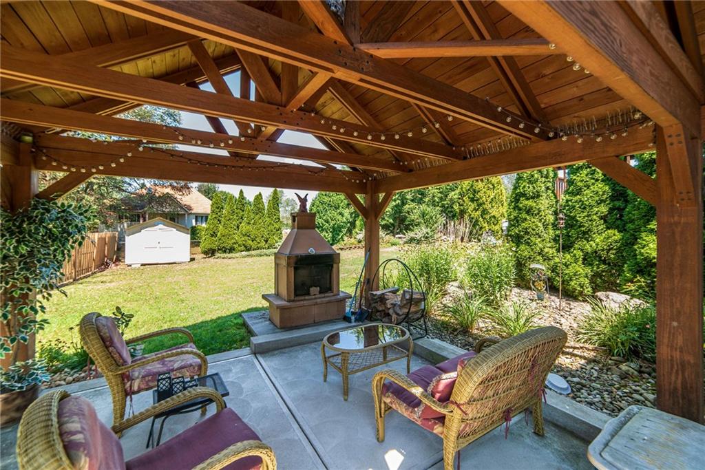 170 McDermott Road Trafford, PA 15085 - Photo 21 of 25 Patio with Pavilion and fire pit. Shed at the back of the yard,