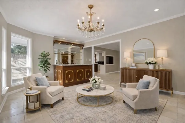 a living room with furniture and a large window