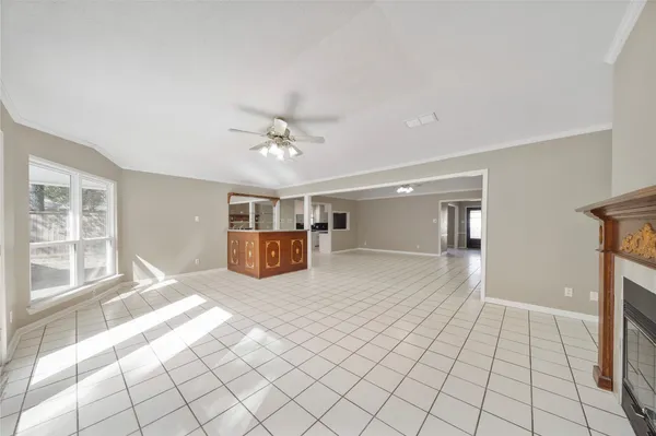 a view of an empty room and window