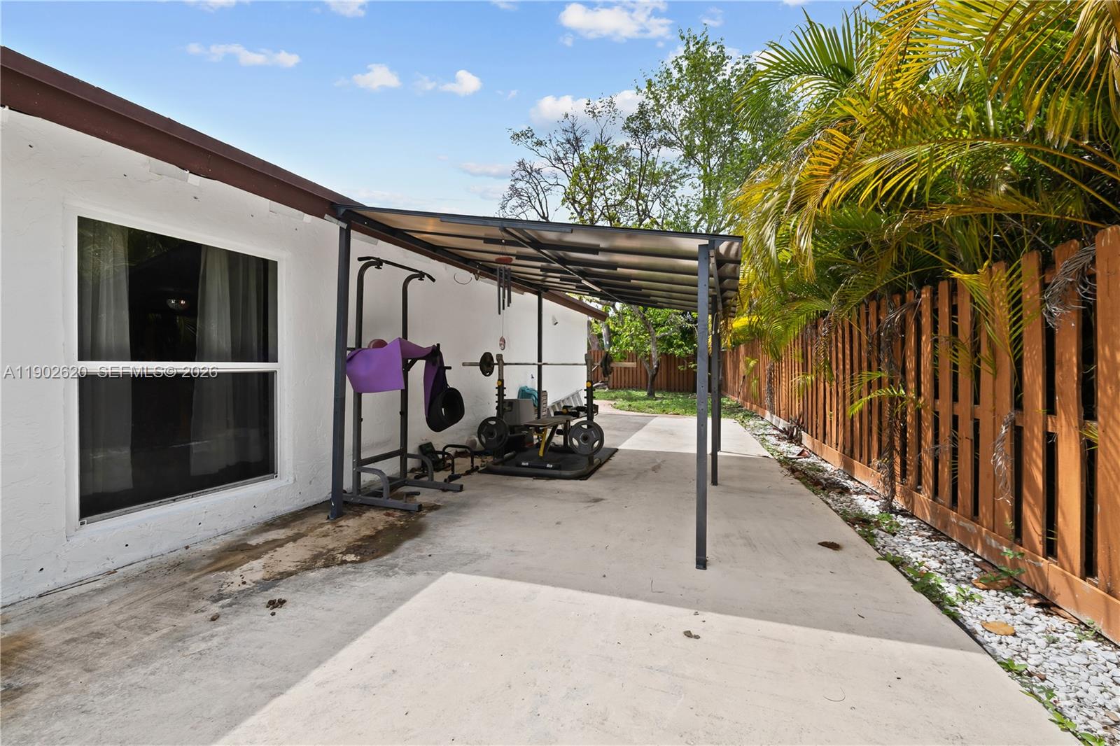 10610 Southwest 128th Avenue Miami, FL 33186 - Photo 13 of 46 a view of a room with gym equipment
