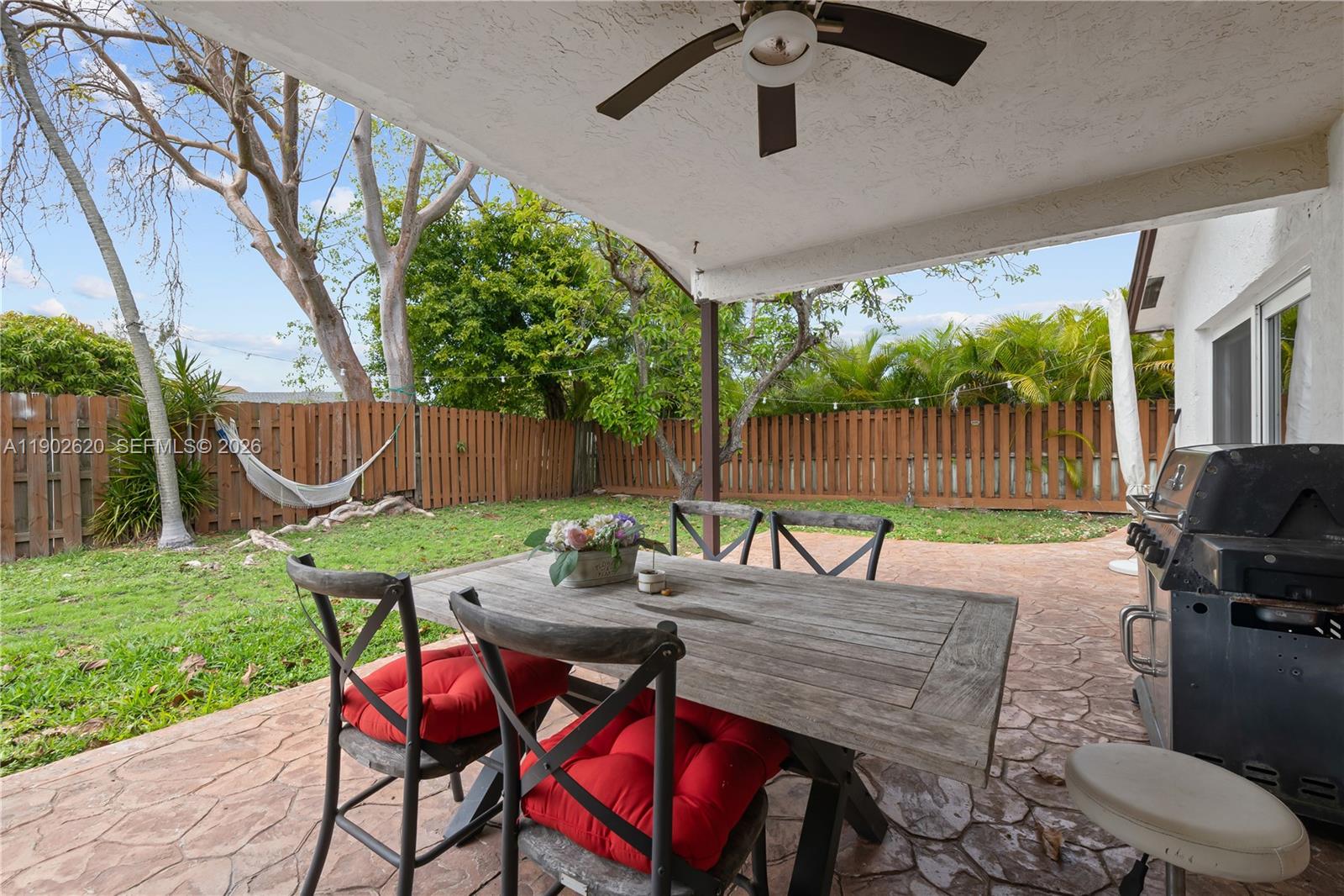 10610 Southwest 128th Avenue Miami, FL 33186 - Photo 16 of 46 a view of outdoor space yard and patio