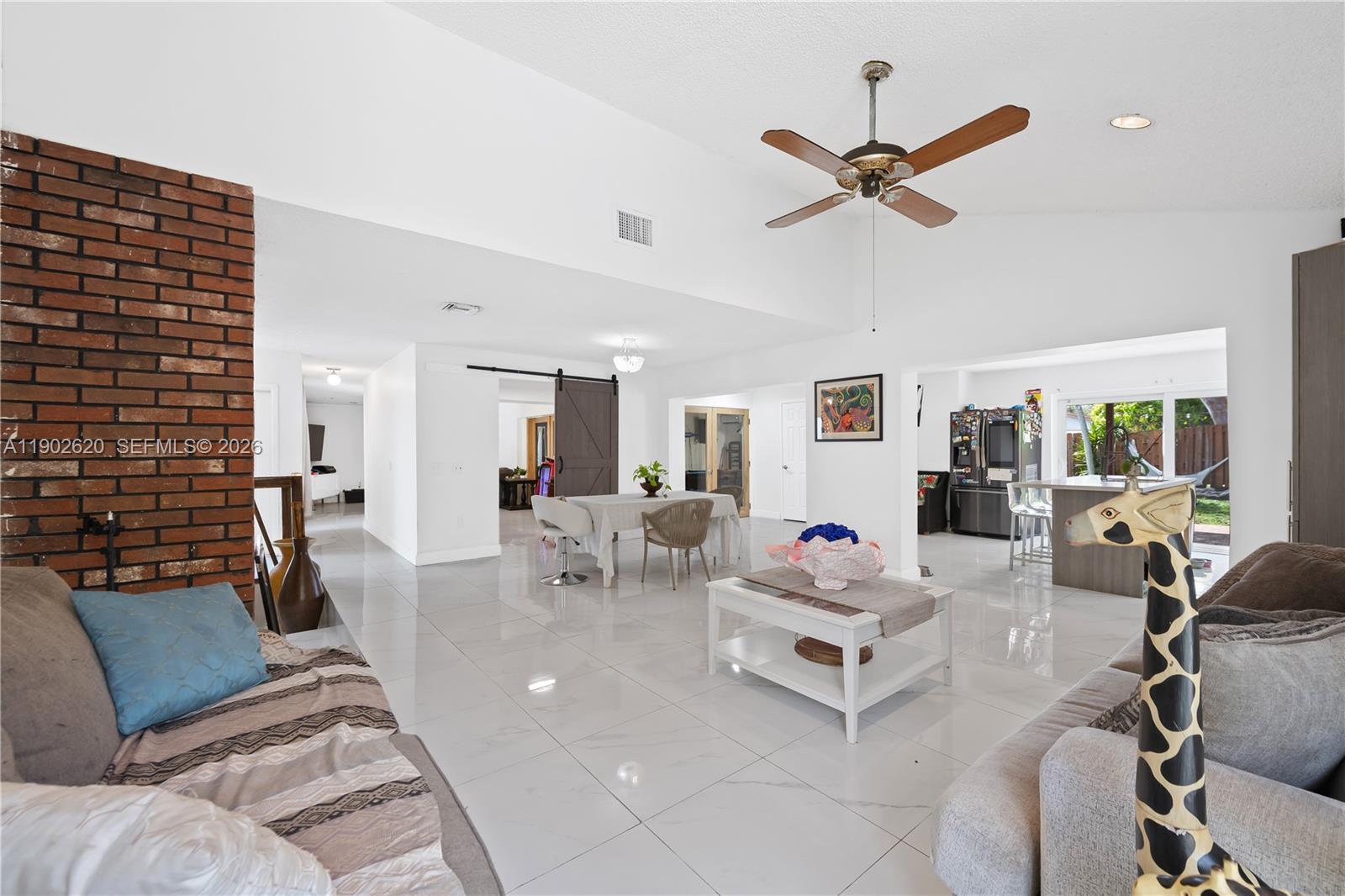 10610 Southwest 128th Avenue Miami, FL 33186 - Photo 35 of 46 a living room with furniture