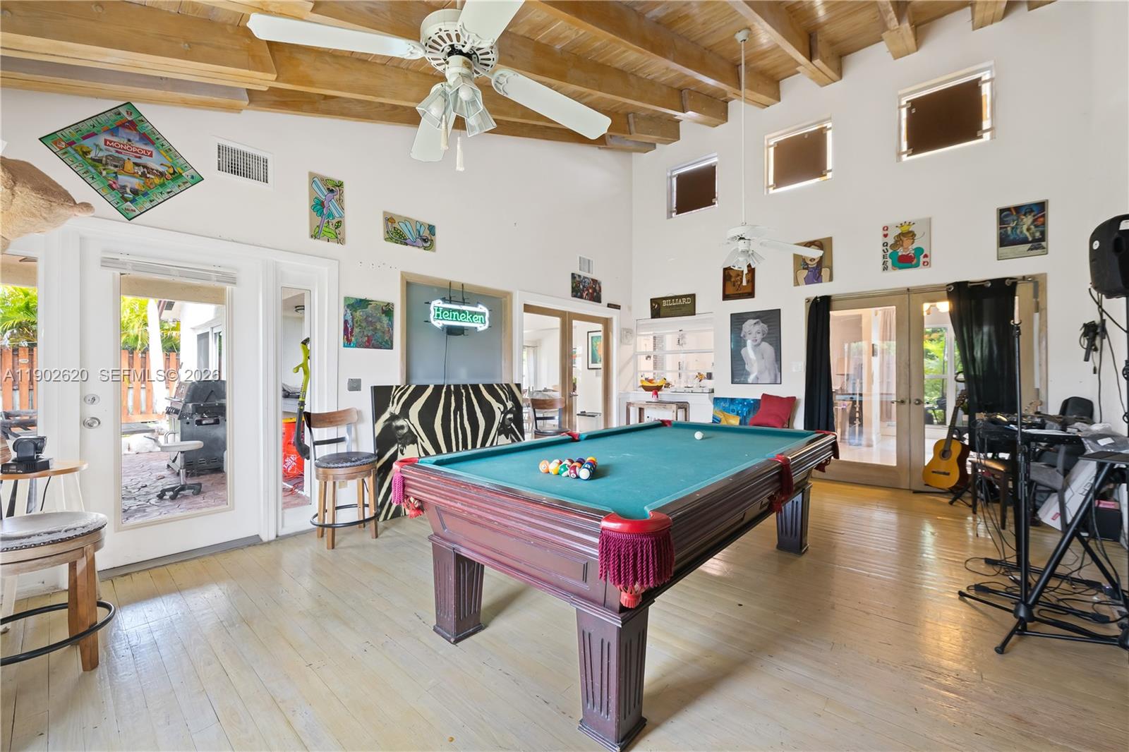 10610 Southwest 128th Avenue Miami, FL 33186 - Photo 40 of 46 a room with pool table and windows
