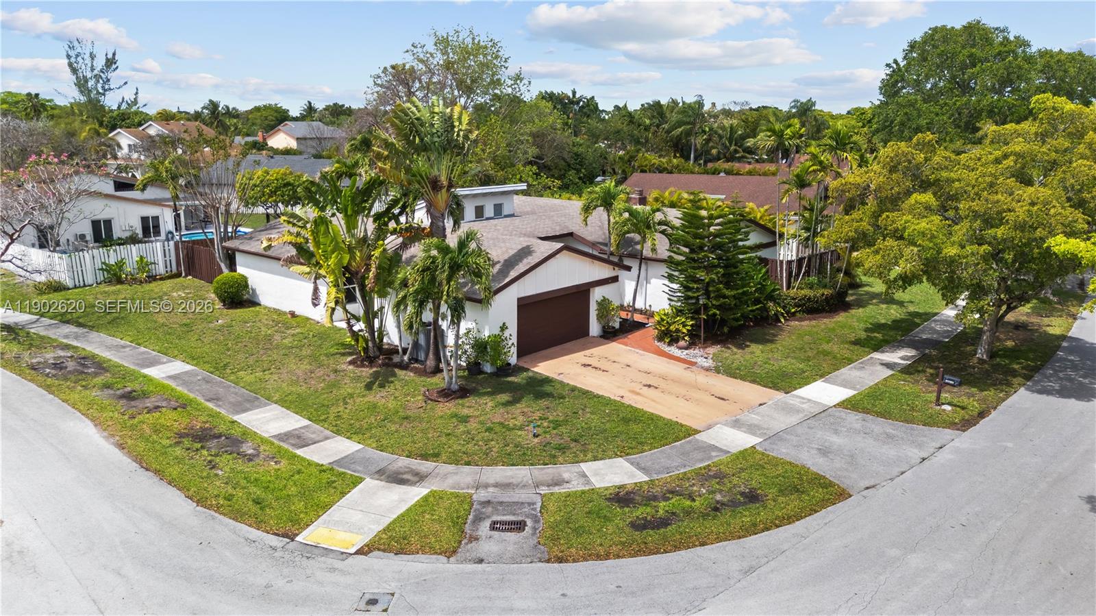 10610 Southwest 128th Avenue Miami, FL 33186 - Photo 4 of 46 a view of a house with a yard