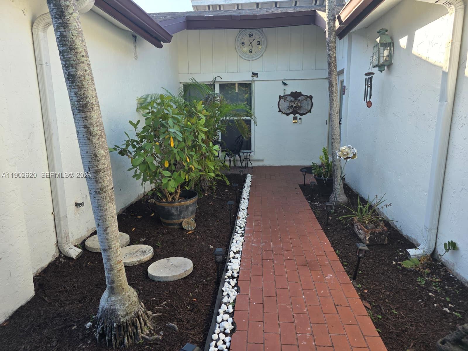 10610 Southwest 128th Avenue Miami, FL 33186 - Photo 9 of 46 a view of a porch