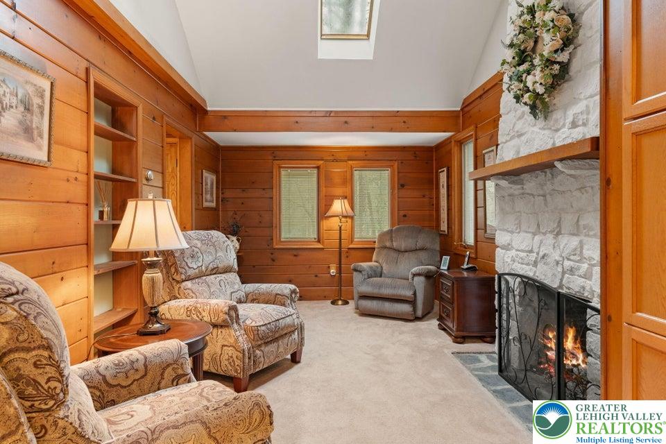15 Hazard Run Road Lake Harmony, PA 18624 - Photo 13 of 48 a living room with furniture and a fireplace