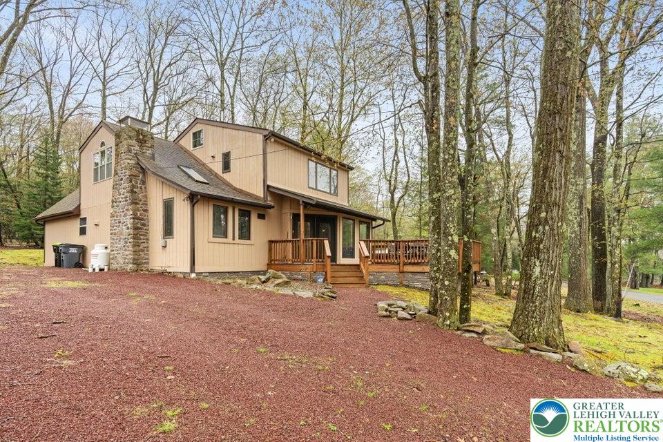 15 Hazard Run Road Lake Harmony, PA 18624 - Photo 2 of 48 a front view of a house with a yard