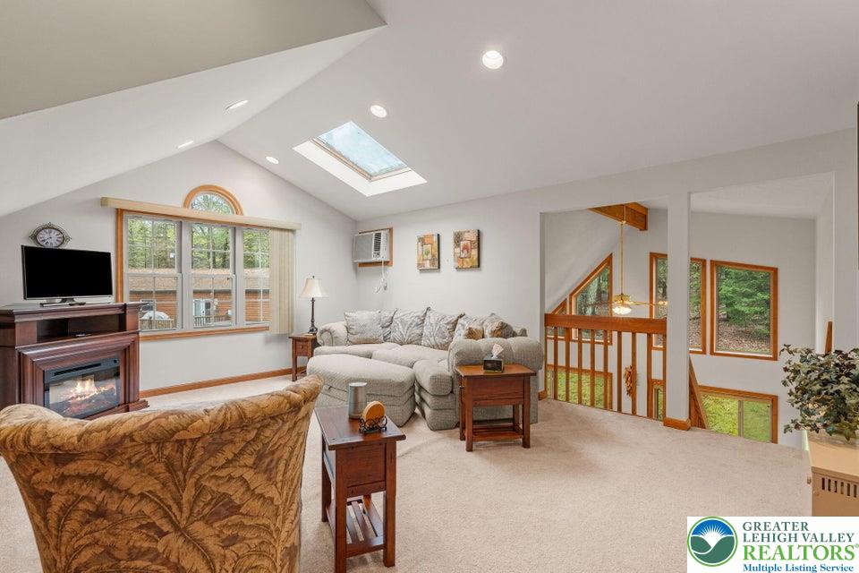 15 Hazard Run Road Lake Harmony, PA 18624 - Photo 34 of 48 a living room with furniture tv and a window