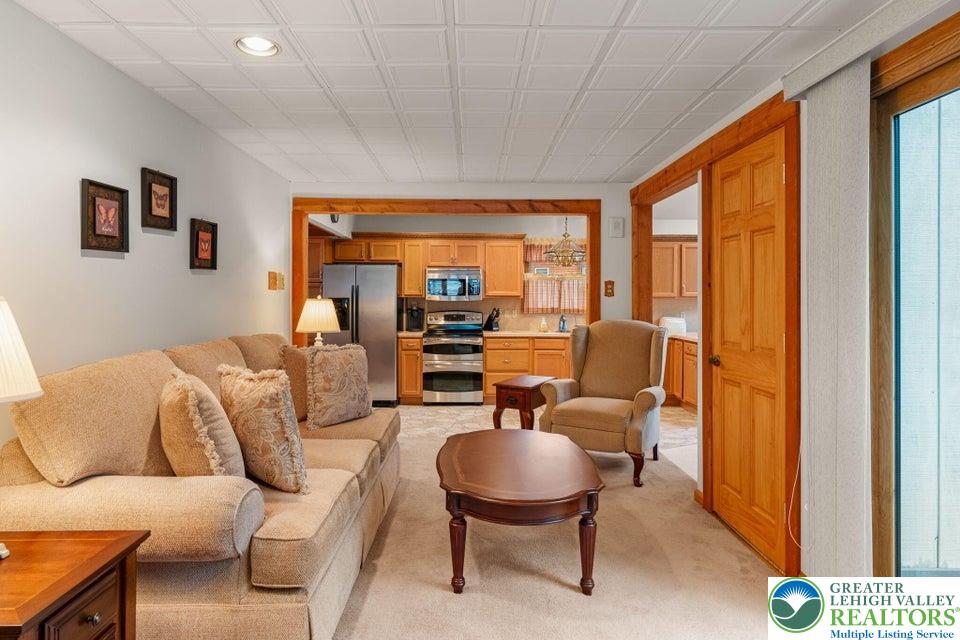 15 Hazard Run Road Lake Harmony, PA 18624 - Photo 38 of 48 a living room with furniture and a large window