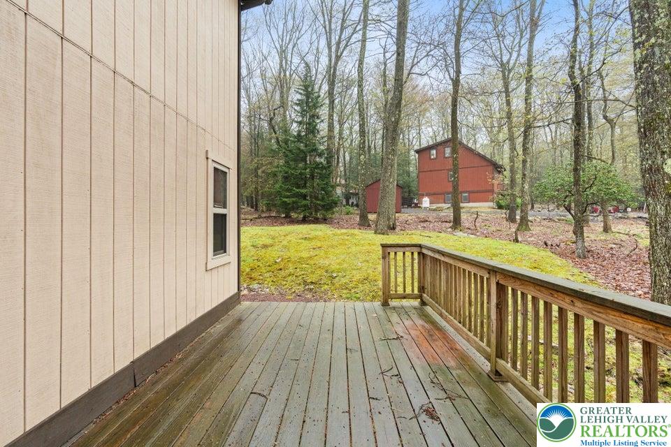 15 Hazard Run Road Lake Harmony, PA 18624 - Photo 41 of 48 a view of balcony with wooden floor and fence