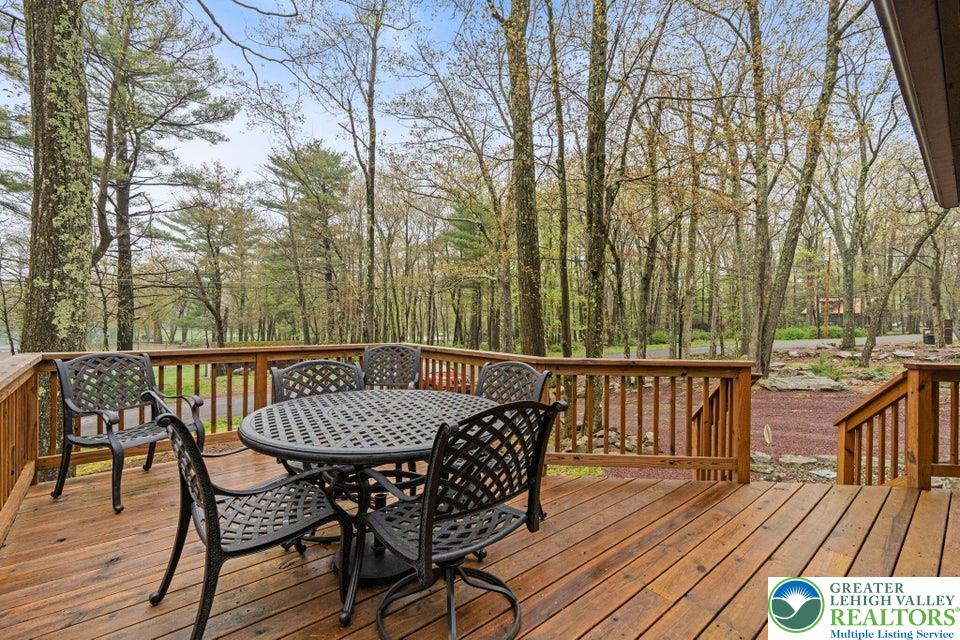 15 Hazard Run Road Lake Harmony, PA 18624 - Photo 45 of 48 a view of a wooden chairs on deck with wooden floor and fence