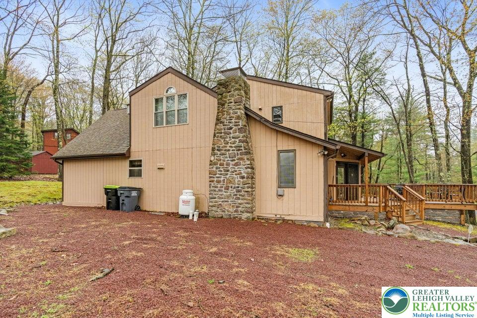 15 Hazard Run Road Lake Harmony, PA 18624 - Photo 47 of 48 a view of a house with a yard and garage