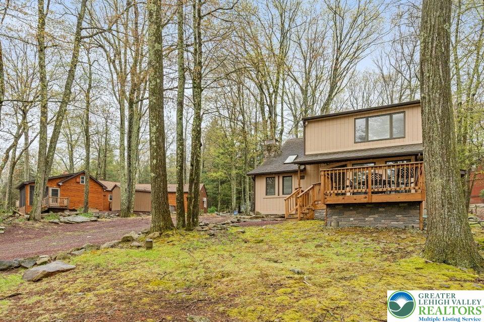 15 Hazard Run Road Lake Harmony, PA 18624 - Photo 48 of 48 a view of a house with large trees and sitting area