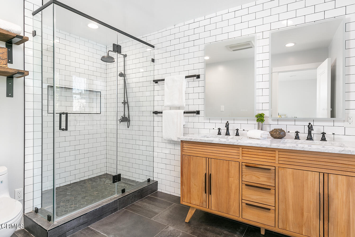 2040 North Madison Avenue Altadena, CA 91001 - Photo 27 of 53 a bathroom with a double vanity sink mirror and shower