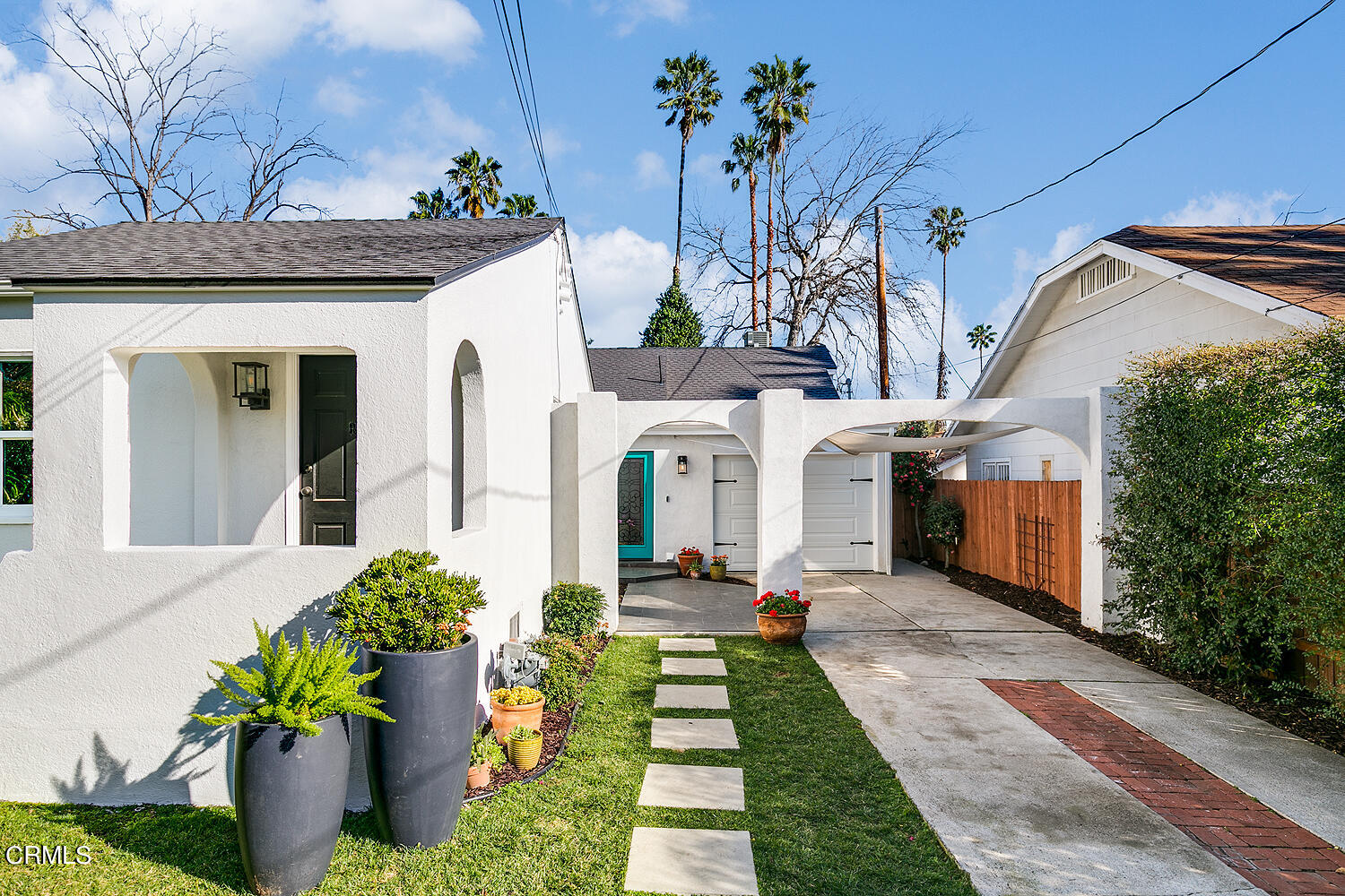 2040 North Madison Avenue Altadena, CA 91001 - Photo 5 of 53 a front view of a house with garden